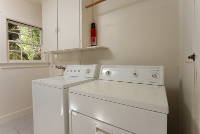 Tile kitchen - Refrigerator - New gas range - Disposal
